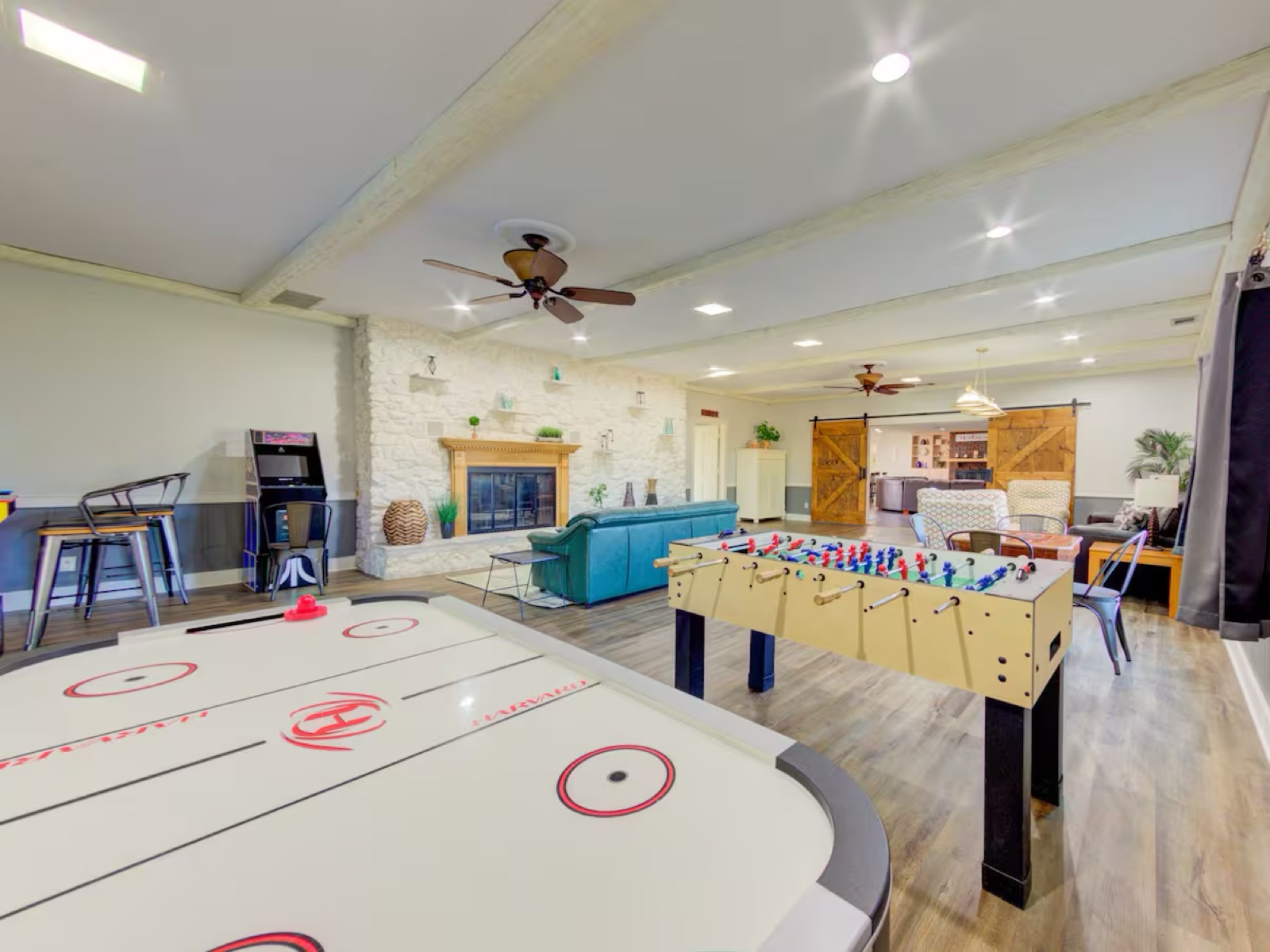 Game room with air hockey and foosball
